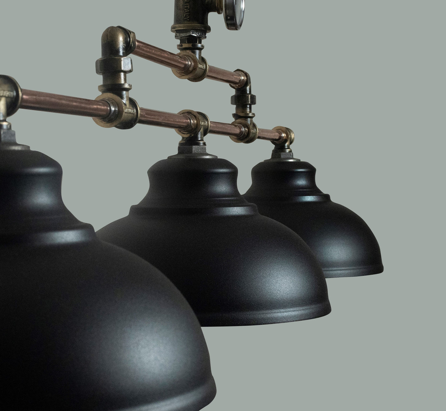 Industrial hanging black chandelier for billiard table. Rustic ceiling lighting for a kitchen island.