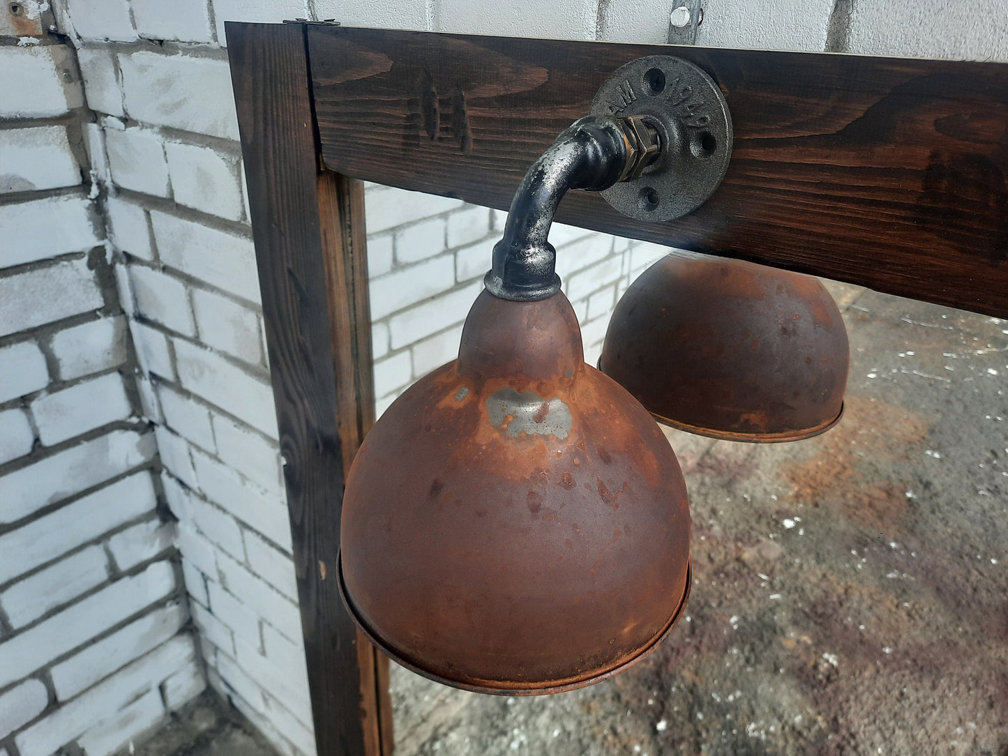 Rusty wall lamp in industrial style. Wall sconce.