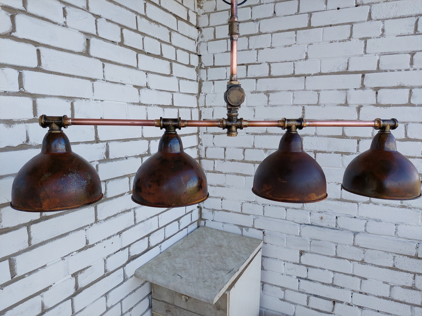 Rusty industrial ceiling chandelier. Rustic pendant lamp for a country house.Kitchen hanging lamp for dining table.