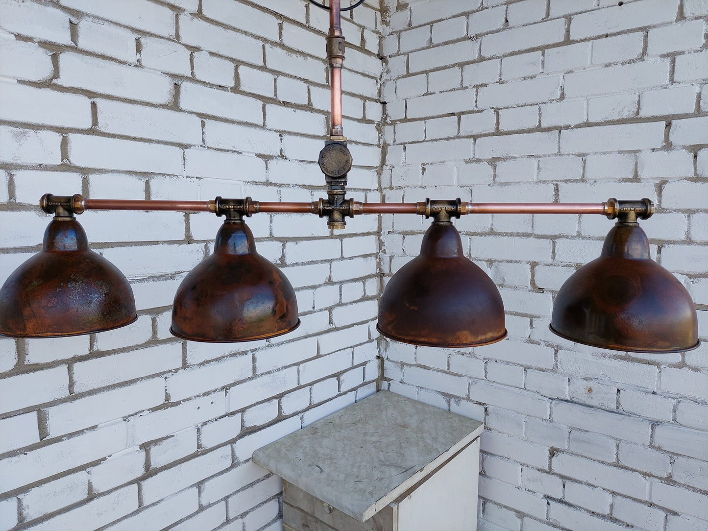 Rusty industrial ceiling chandelier. Rustic pendant lamp for a country house.Kitchen hanging lamp for dining table.