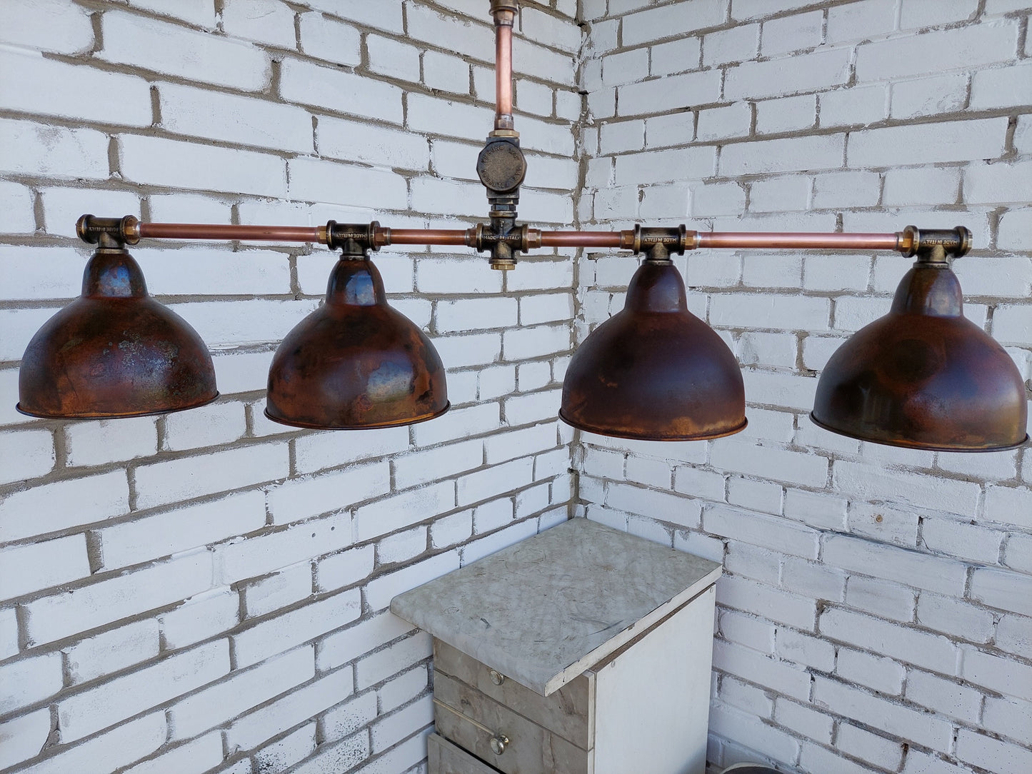 Rusty industrial ceiling chandelier. Rustic pendant lamp for a country house.Kitchen hanging lamp for dining table.