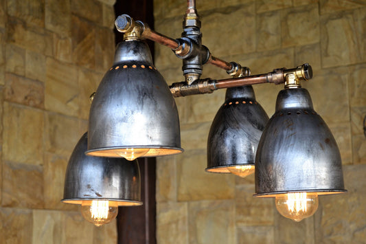 Industrial pendant chandelier in steampunk style. Hanging ceiling lamp for hall and dining room