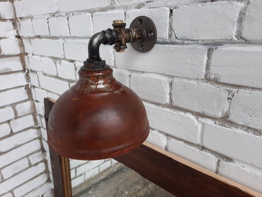 Rusty hanging wall lamp.Industrial wall light.