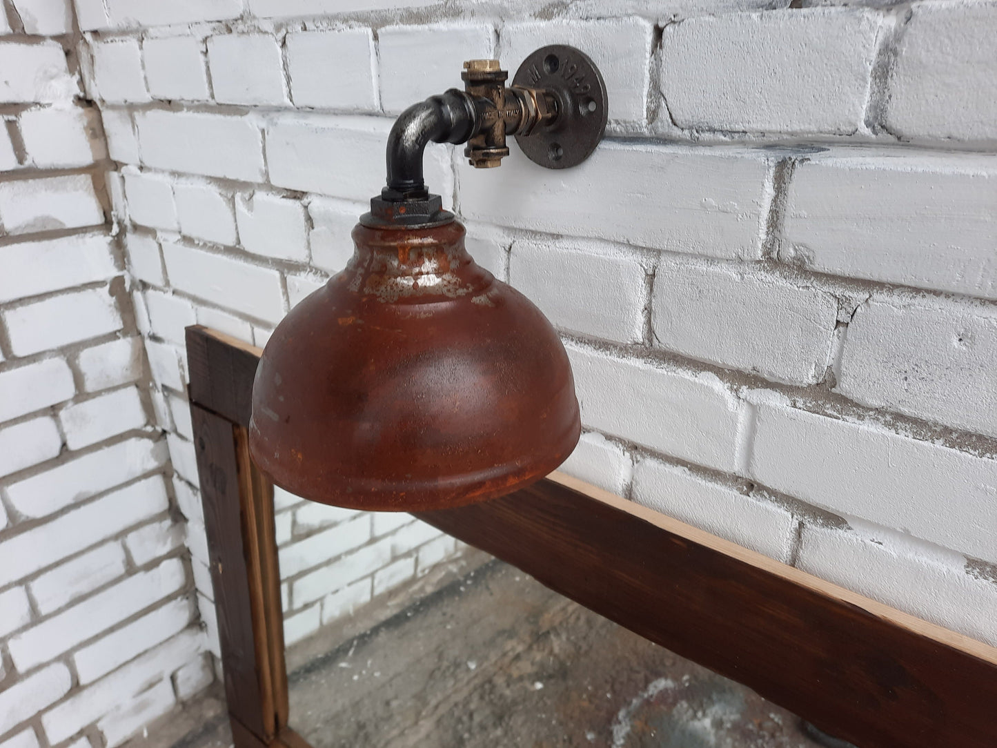 Rusty hanging wall lamp.Industrial wall light.