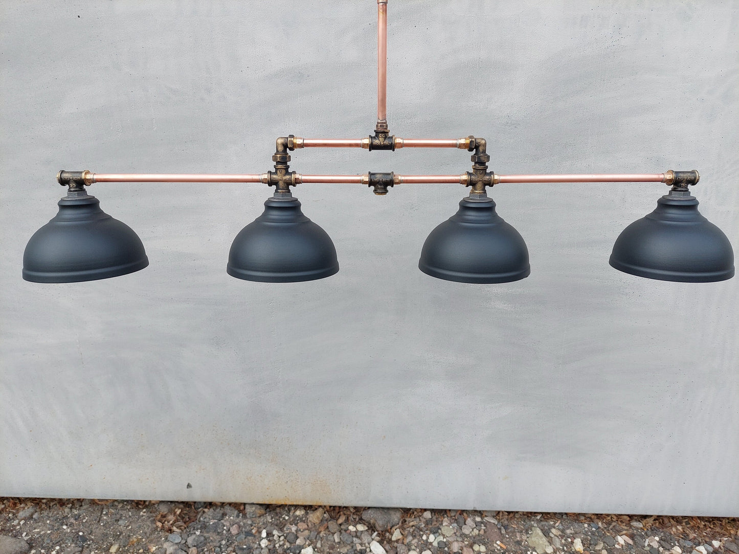 Industrial pendant lighting for the kitchen island. A long copper rustic chandelier for a billiard or dining table.