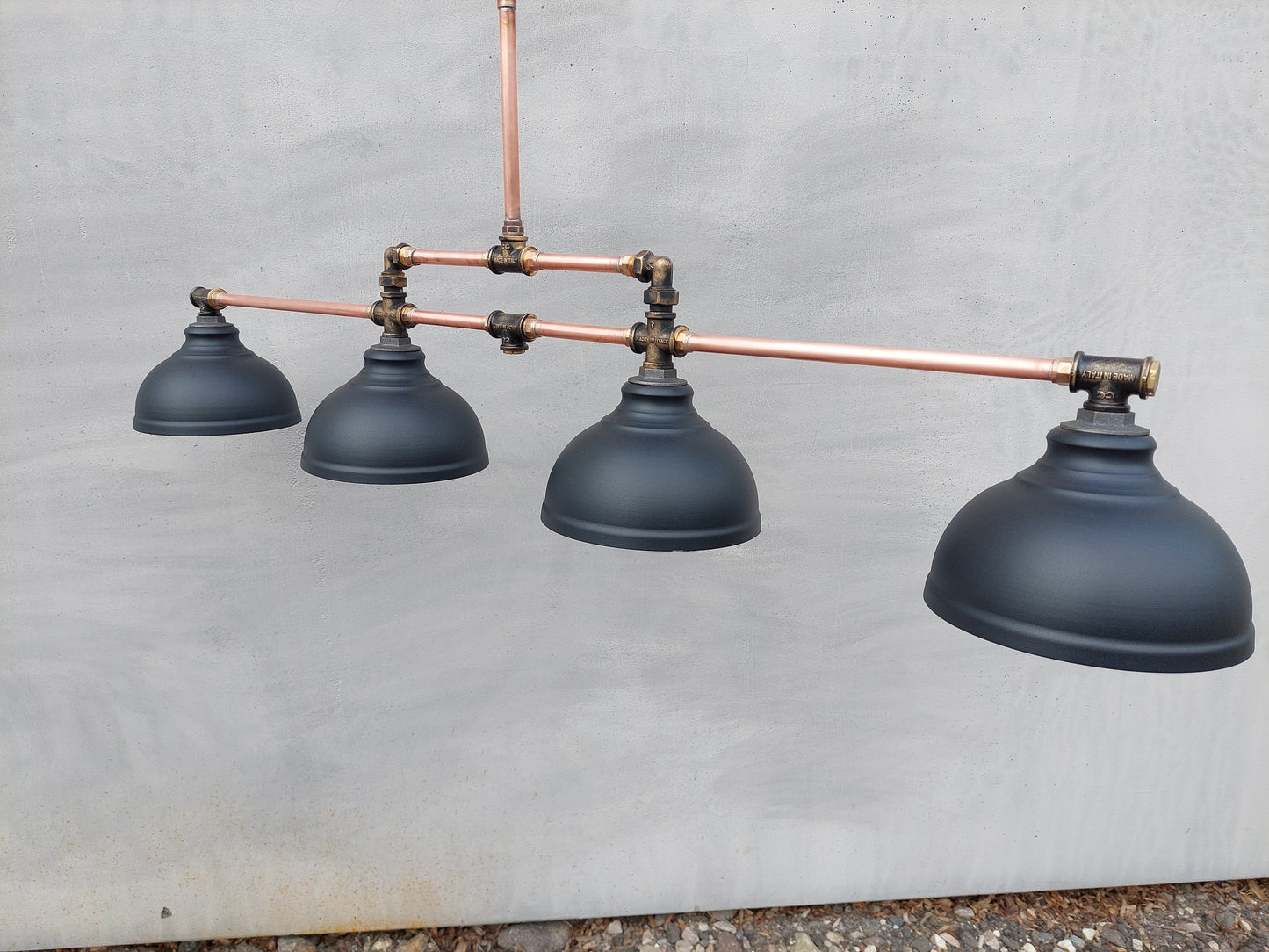 Industrial pendant lighting for the kitchen island. A long copper rustic chandelier for a billiard or dining table.