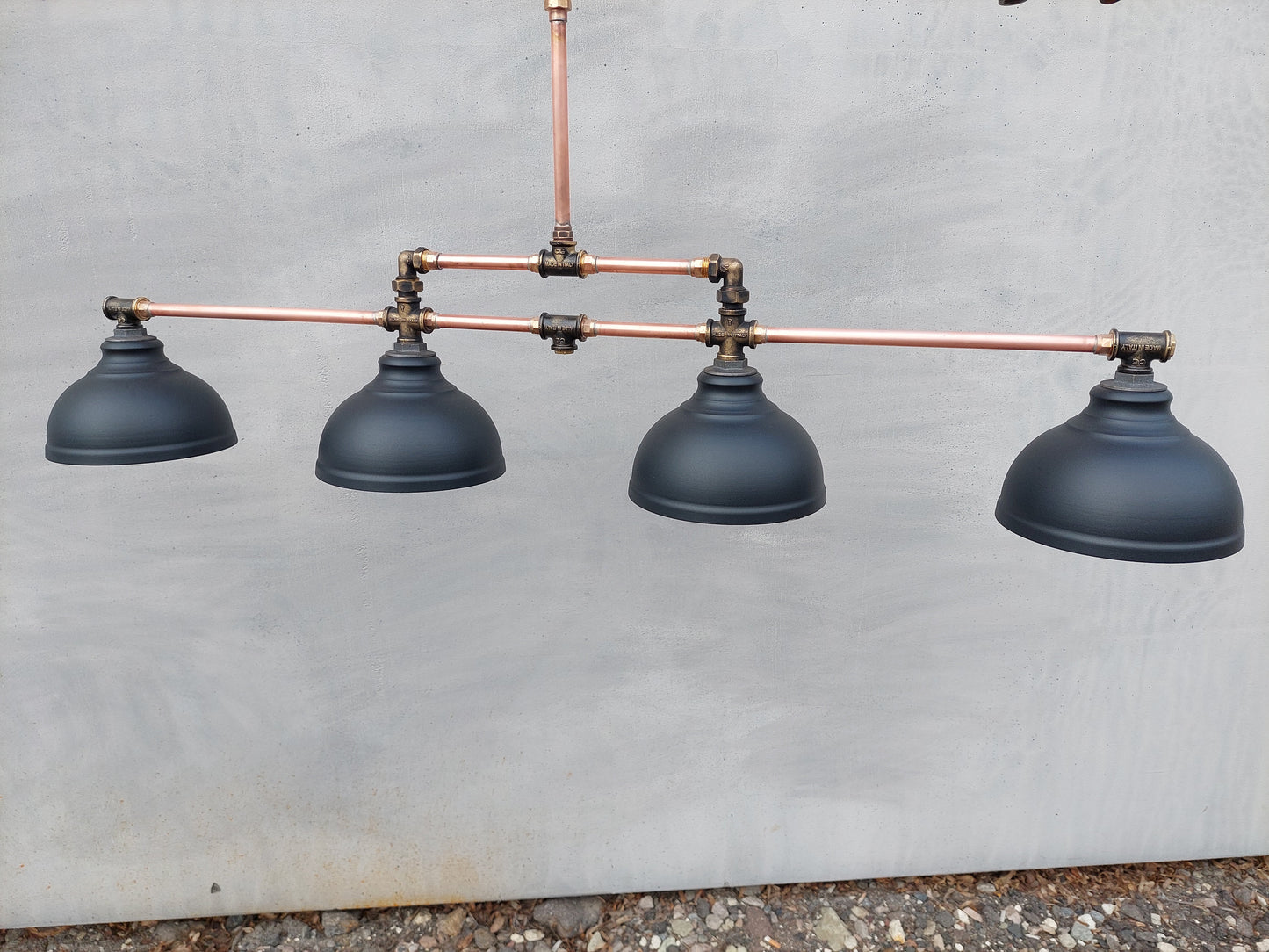 Industrial pendant lighting for the kitchen island. A long copper rustic chandelier for a billiard or dining table.