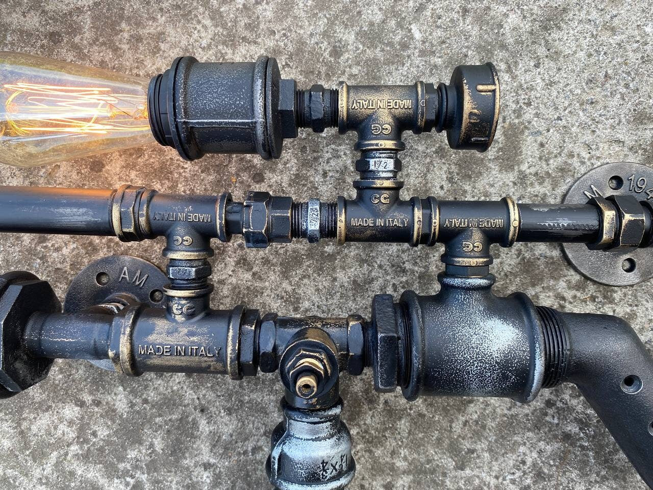 Vintage steampunk style wall light.Rustic industrial wall light.